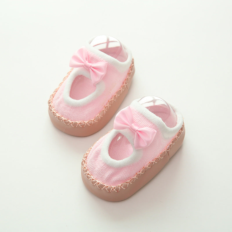 Baby-Schuhe mit Schleife und rutschhemmender Sohle in Rosa