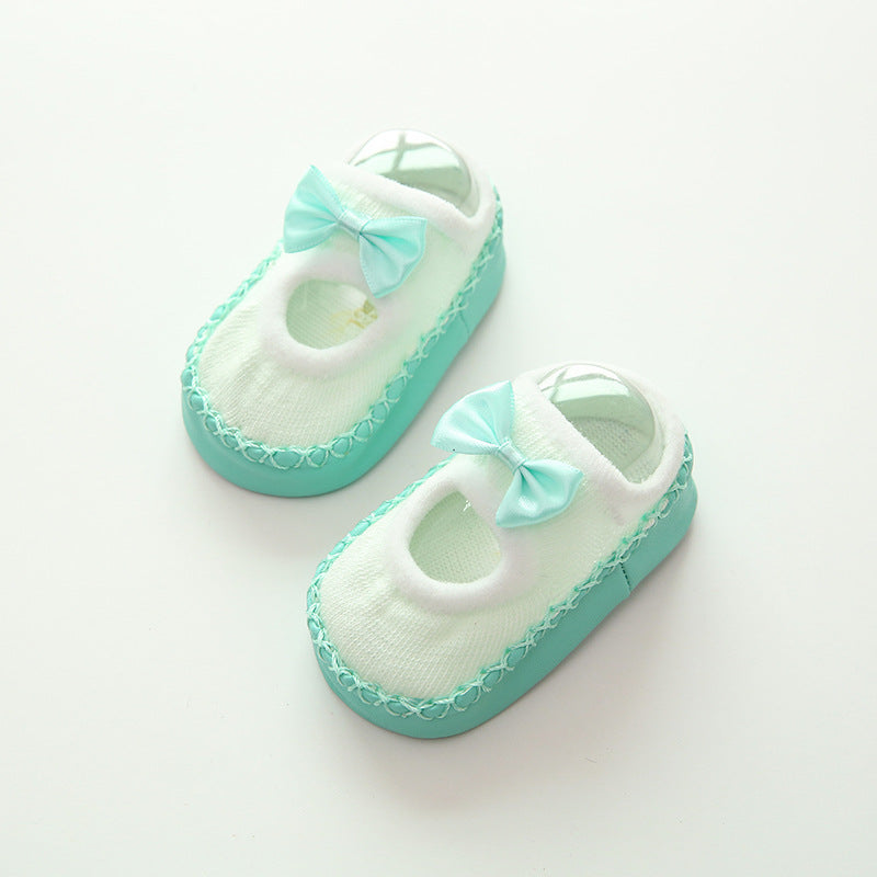 Baby-Schuhe mit Schleife und rutschhemmender Sohle in Mint