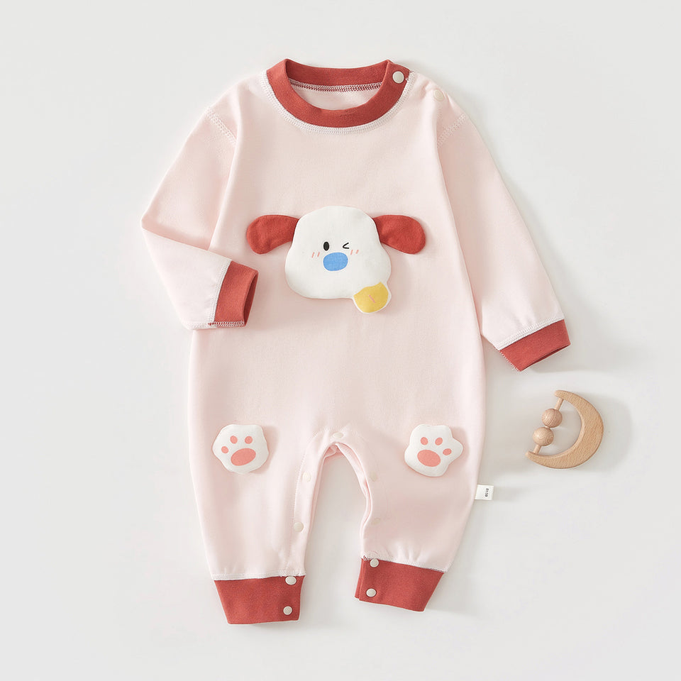 Rosa Baby-Strampler mit Hundeapplikation und roten Bündchen