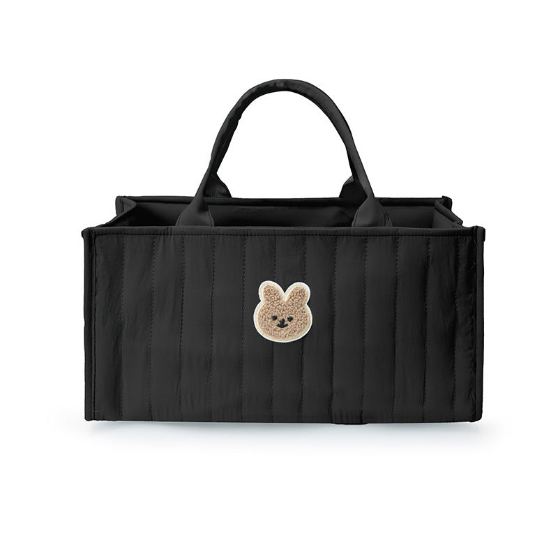 Schwarzer gesteppter Windel-Caddy mit Hasen-Applikation und zwei Griffen
