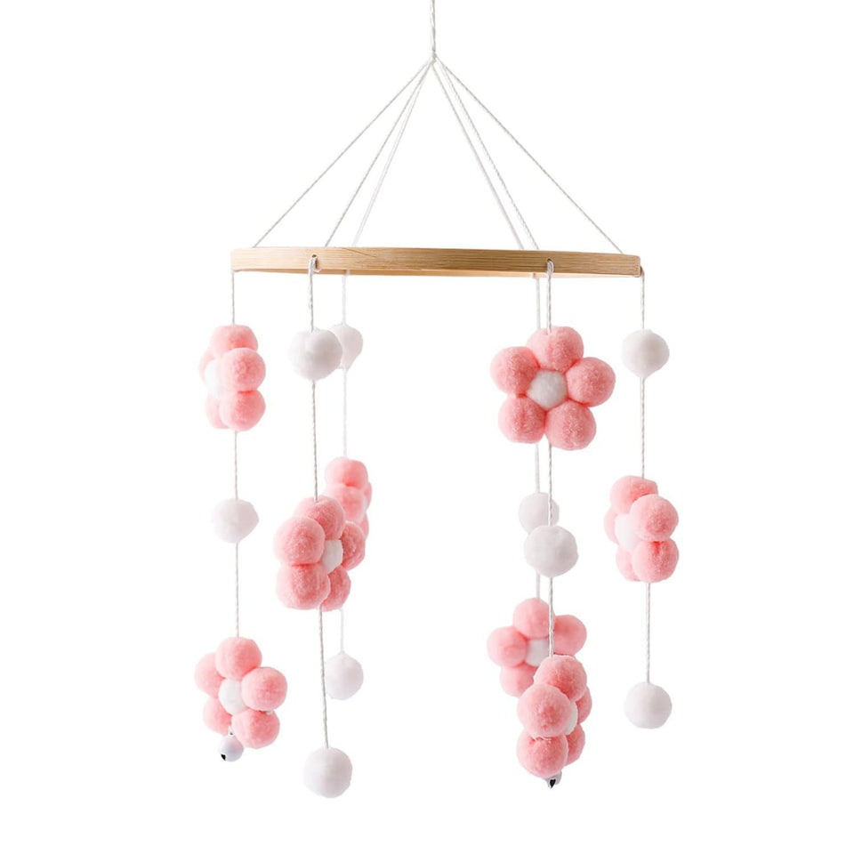 Mobile mit rosa und weißen Pompon-Blumen am Holzring