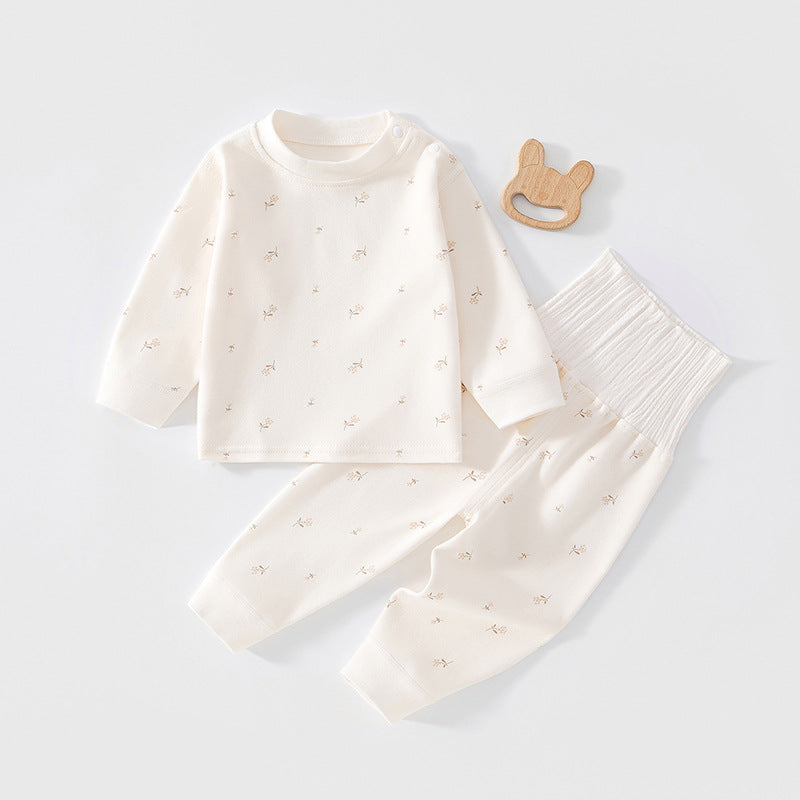 Cremefarbenes Baby-Set mit zarten Blümchen