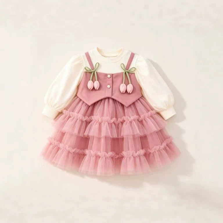 Rosa Tüllkleid mit weißen Puffärmeln und Weste-Optik, flach ausgelegt
