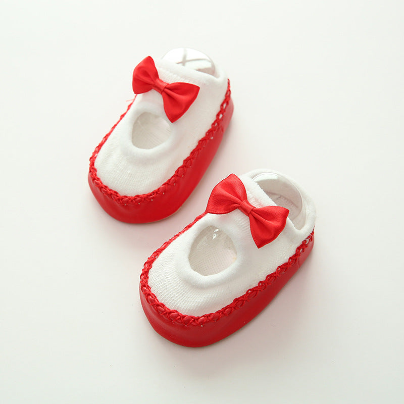 Baby-Schuhe mit Schleife und rutschhemmender Sohle in Rot