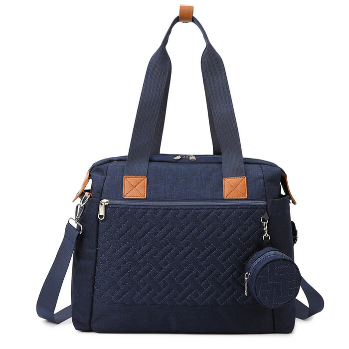 Kleine marineblaue Wickeltasche mit Steppmuster, Rundtasche und Schultergurt