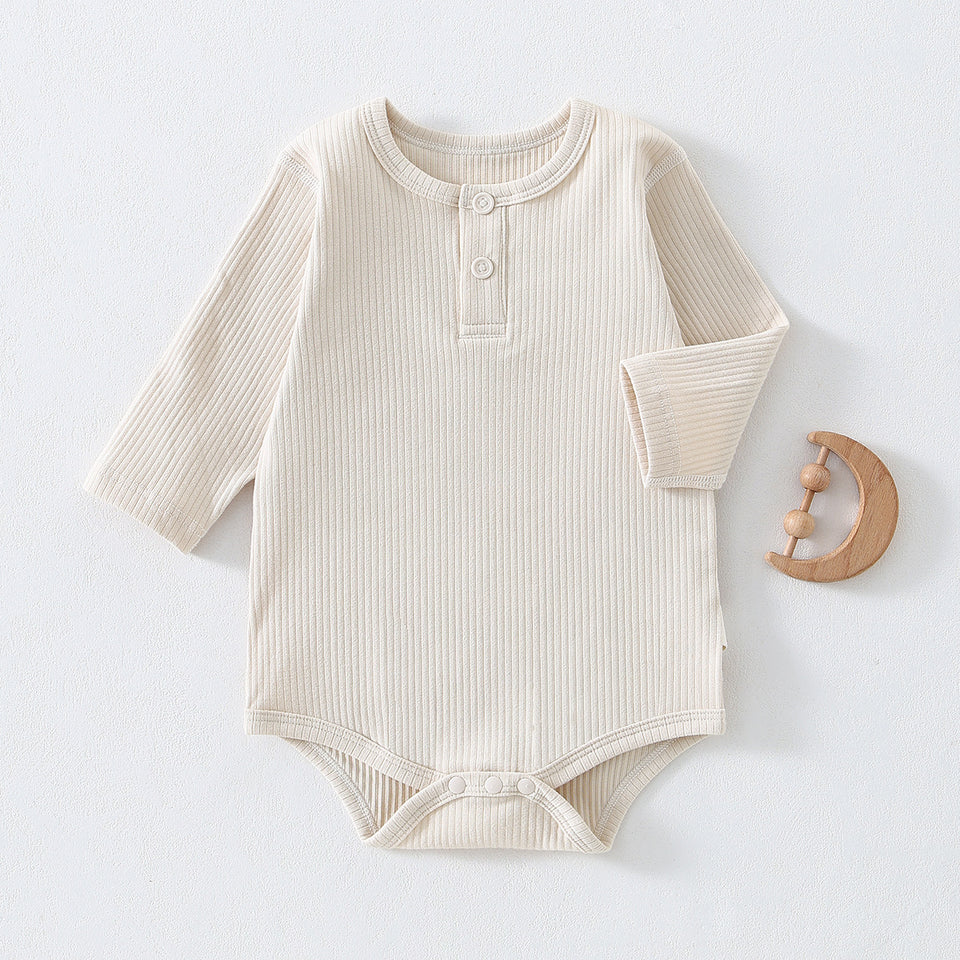 Cremefarbener gerippter Baby-Body