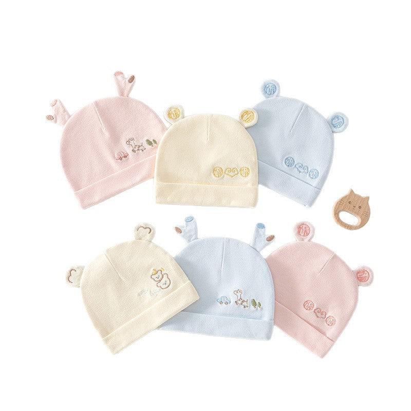 Sechs Neugeborenen-Mützen in Rosa, Gelb und Blau mit Öhrchen