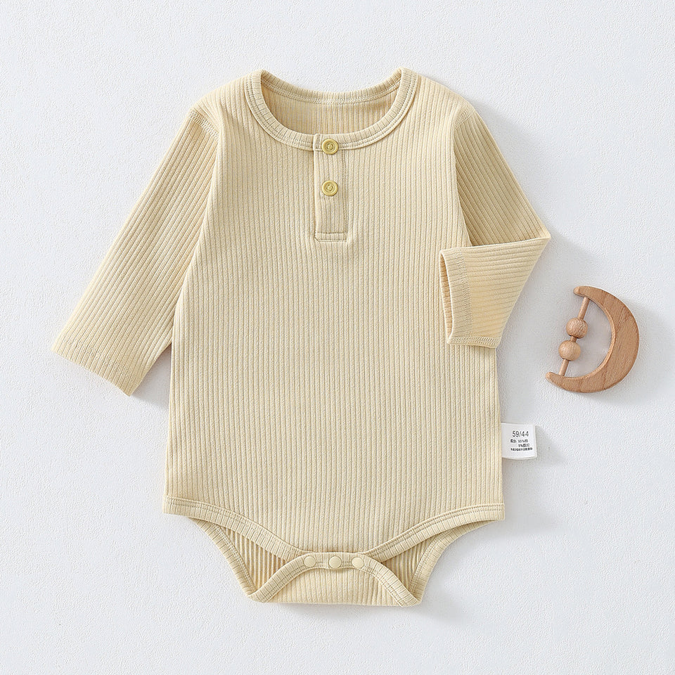 Gelber gerippter Baby-Body