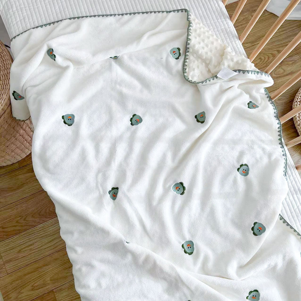 Fleece-Babydecke mit grünen Dinos