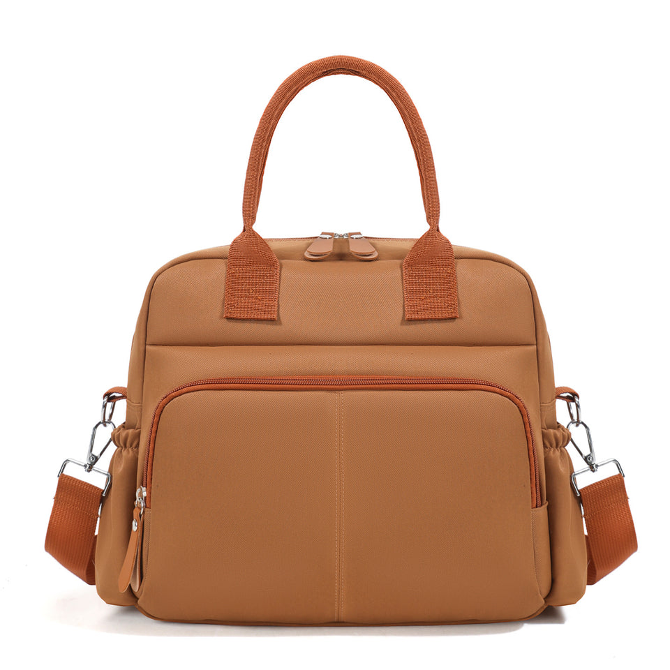 Braune Wickeltasche mit Kontrastgriffen und Fronttasche