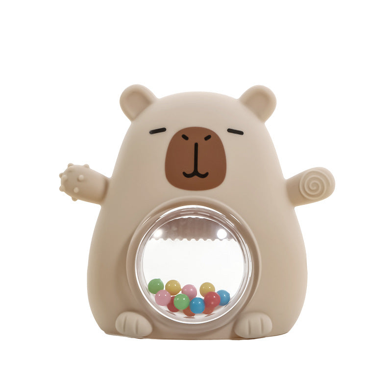 Wasserschwein-Rassel aus Silikon in Creme mit Kugelfenster