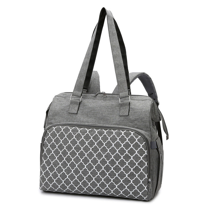 Graue Wickeltasche mit Gittermuster, Henkeln und Rucksackgurten