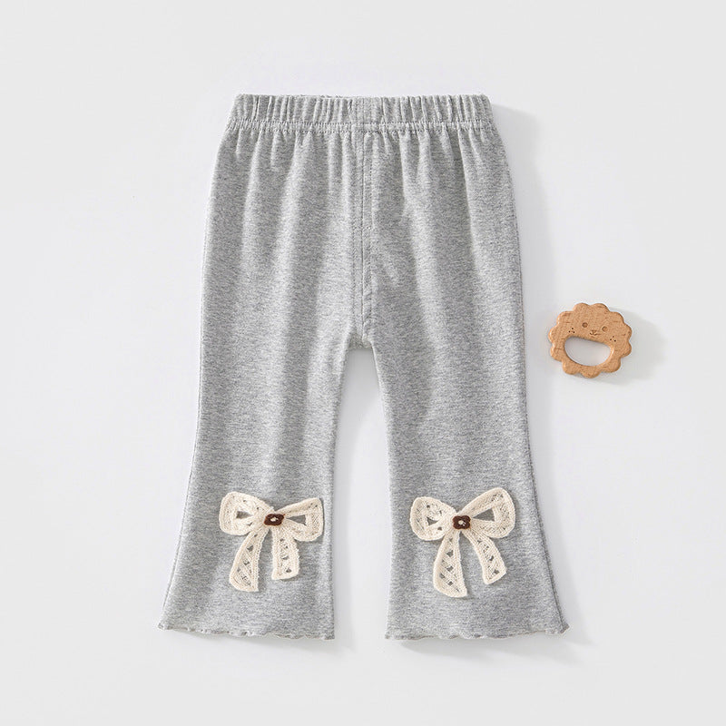 Graue Leggings mit großer Spitzenschleife am Bein